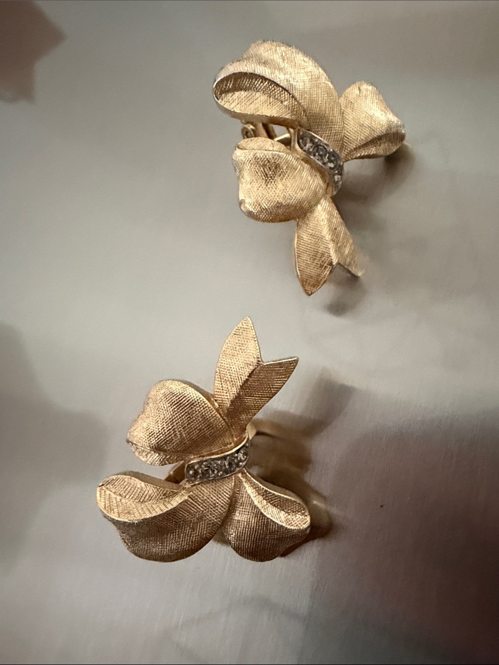Trifari vintage Gold Bow Clip Earrings with Rhinestone Accent